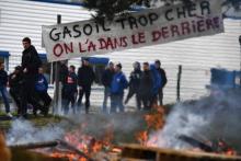 Des manifestants protestent contre la hausse des prix du gazole à Brest, le 15 mars 2022