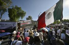 Des soutiens du président mexicain, Andres Manuel Lopez Obrador, manifestent en faveur de son projet de réforme constitutionnelle renforçant le rôle du secteur public dans la production d'électricité,